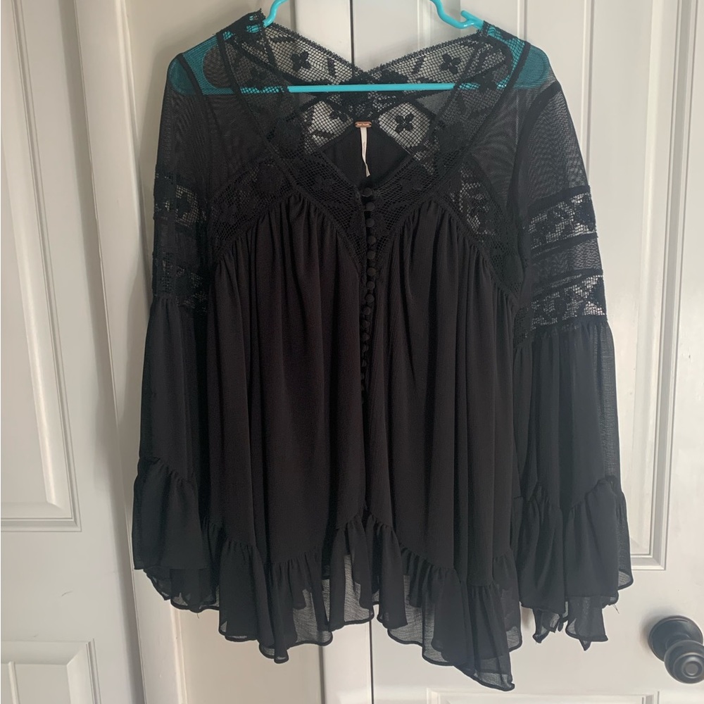 The prettiest Free People top- All Night Tunic: beautiful lace and ruffles